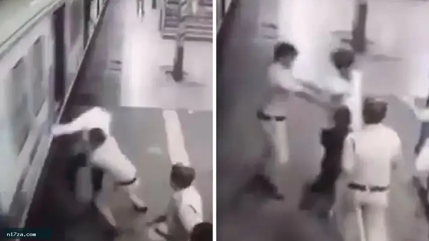 حاول ركوب قطار متحرك.. شرطي ينقذه قبل سقوطه بين القطار والرصيف ! حاول ركوب قطار متحرك.. شرطي ينقذه قبل سقوطه بين القطار والرصيف !