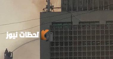 استمرار رجال الحماية المدنية في تبريد حريق مبنى سنترال رمسيس